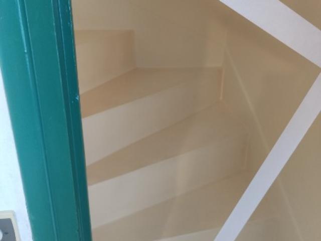Rénovation en peinture d'une cage d’escalier situé à Troarn.